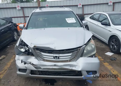 2010 Honda Odyssey Ex-L z USA, uszkodzony, nr VIN 5FNRL3H78AB036216